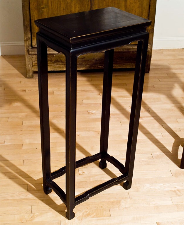 Pair of black lacquer stands