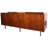 Classic Florence Knoll walnut credenza with sliding doors