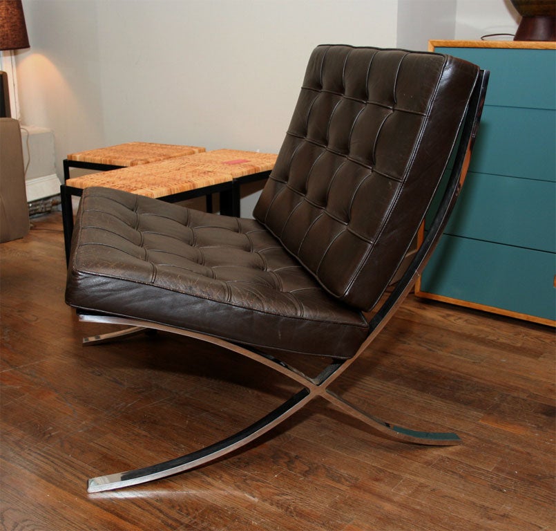 Leather Set of brown leather Barcelona chairs with ottoman, mfg. Knoll