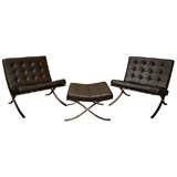 Set of brown leather Barcelona chairs with ottoman, mfg. Knoll