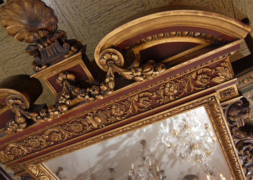 Heavily carved and dimensional mirror, Regency