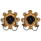 Pair of patinated metal and bronze sconces
