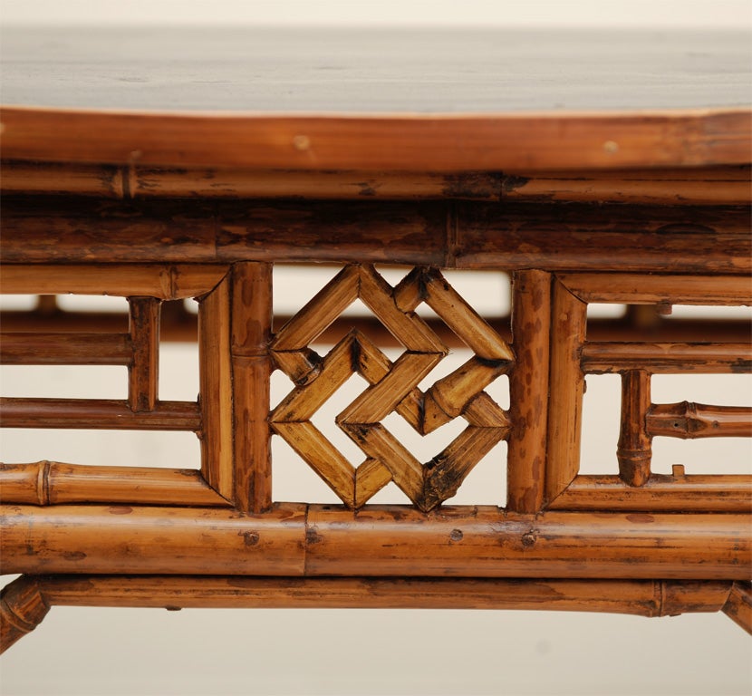 PAIR OF BAMBOO DEMILUNE TABLES
