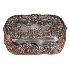 An Oval-Shaped Box with Allover Decoration