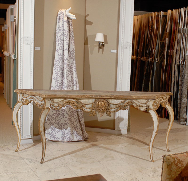 Beautiful Louis XV Italian Console Table with carved frieze with central cartouch and serpentine top.