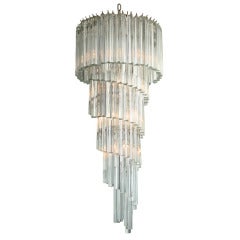 A Monumental Camer Glass Crystal and Polished Chrome Chandelier