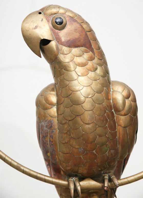 Fun copper and brass Bustamante parrot. Large size, highly desired by collectors.