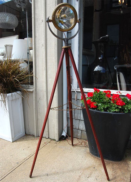 Nautical search light on tripod base