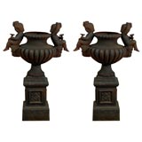 Pair of 19th Century French Iron Jardinieres with Cherub Handles