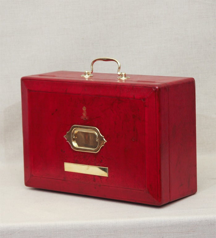 Distinctive Red Leather Ministerial Document Box with Inset Brass Handle on Top and  Brass Carrying Handle on Side.  Top Embossed with Royal Monogram of Edward VII, Interior Lined in Black Leather. Signed, 