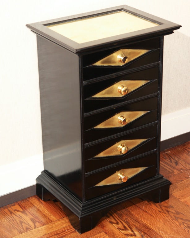 Ebonized Five-Drawer Chest / Night Stand with Recessed Brass Top,  Drawers with Diamond-Shaped Brass Inserts and Brass Knobs, All Supported on Bracket Feet.    England, c. 1930's<br />
<br />
19 inches wide x 14.5 inches deep x 31 inches high