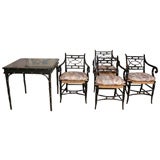 A Regency Style Ebonized Card Table and Four Chairs