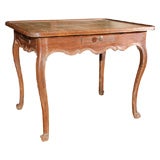 An 18th Century Leather Topped Louis XV Center Table