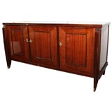 A mahogany sideboard by Maurice Jallot