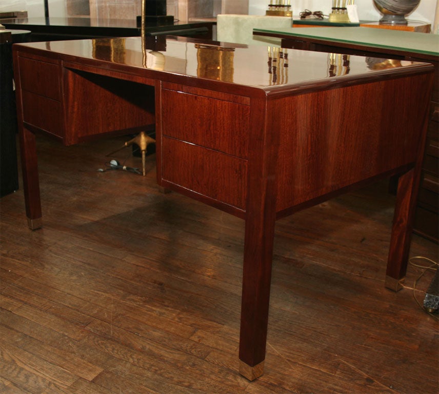A mahogany desk by Rene Herbst