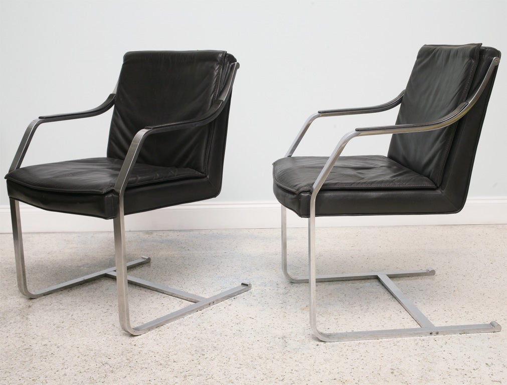The steel frame with black leather upholstered seat, back and armrests. An interpretation of the BRNO chair.