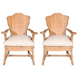 A Pair of English Arm Chairs in Oak with Belgium Linen Cushions