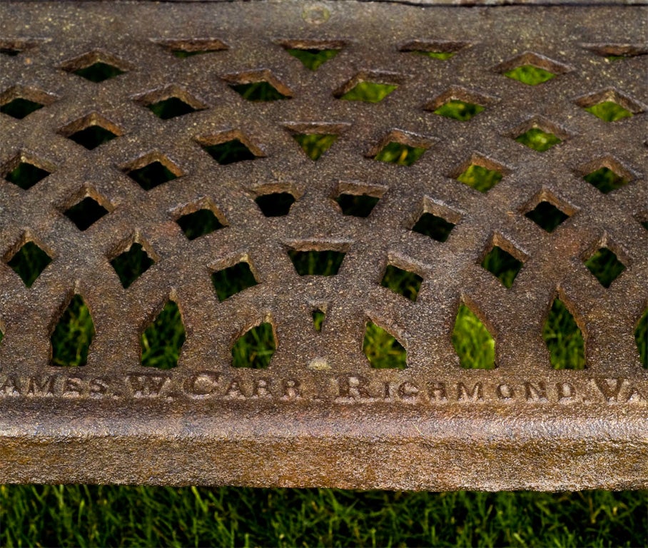 A fine cast-iron bench in the fern pattern, marked 