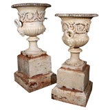 Pair of English 19th century cast iron urns