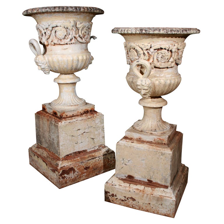 Pair of English 19th century cast iron urns For Sale