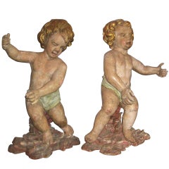 Pair of 18th Century Italian Carved and Polychrome Wood Figures of Putti