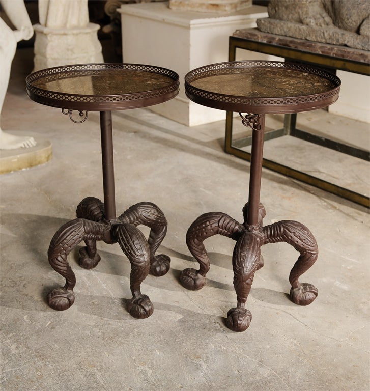 Beautiful Pair of Gueridons, iron base w/ ball and claw feet, adjustable galley w/ marble tops. Great form. Originally owned by Robert Denning (Denning & Fourcade).<br />
Dimensions: 27H x 16.5 diameter