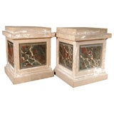 Pair of French theatre pedestals, faux marble paint