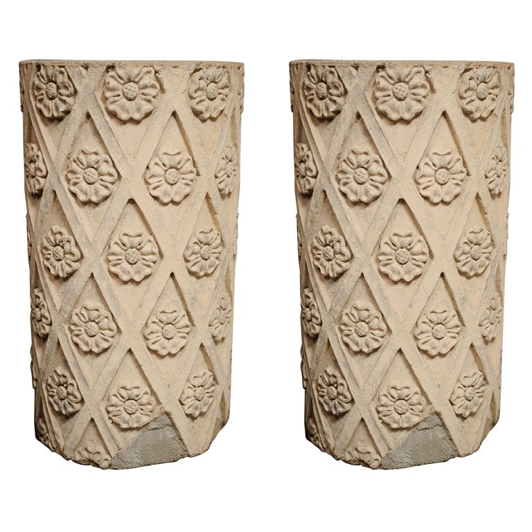 Pair of stone columns/pedestals, rosette 
lattice detail For Sale