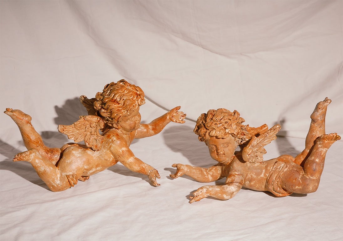 Pair of Carved Putti/Winged Cherub Figures