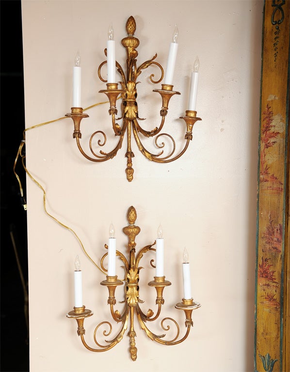 Louis XVI style four arm bronze and wrought iron wall sconces