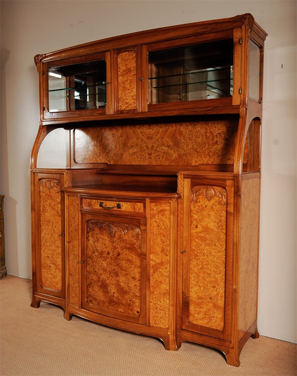 French period Art Nouveau walnut and burl breakfront by Diot