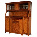 French period Art Nouveau walnut and burl breakfront by Diot