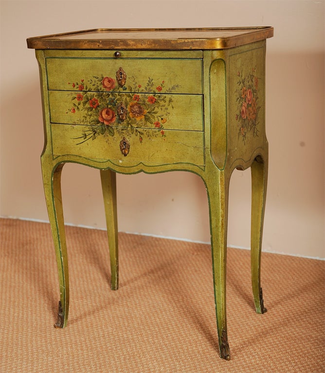 French Louis XV style tiny 3-drawer floral hand-painted commode, marble top with bronze gallery, pull-out shelf with leather top, bronze drawer pulls and sabots