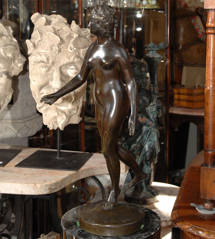 Large classical-style bronze sculpture of Diana the Huntress (missing her bow,) marked Houdon, France, late 19th century.