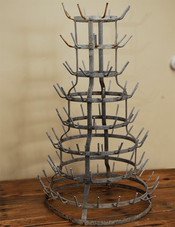 Wonderful French bottle drying rack from the early 1900's.  A great height just right for indoor or outdoor use.