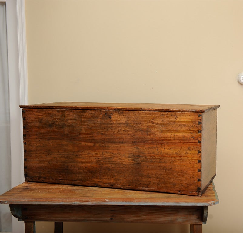 Simple blanket chest.  Six-boards, dovetail construction, forged iron hinges.  Recently refinished.