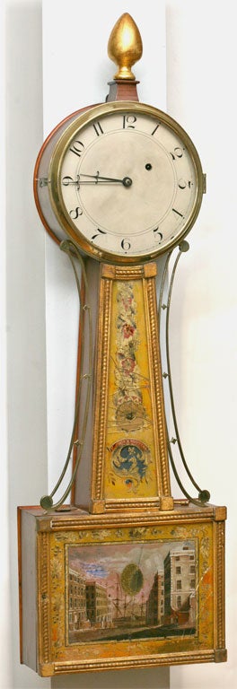Extremely rare period banjo clock made by <br />
Munroe and Whiting of Concord, MA who only produced<br />
these clocks in partnership for two years. Time<br />
only. Weight driven for 8 days