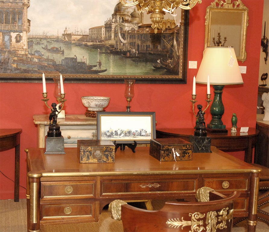 A Pair of Bronze Candlesticks