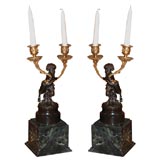 A Pair of Bronze Candlesticks