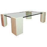 Glass top cocktail table with bone inlay corner supports