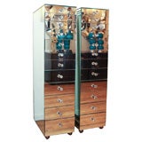 Pair of tall mirrored cabinets