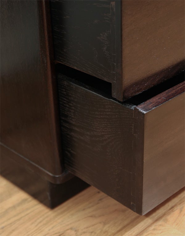 Mid-20th Century Pair of ebonized wood chests of drawers by Dunbar