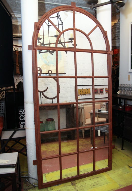 Pair of repurposed French windows, leaded glass replaced with mirror.