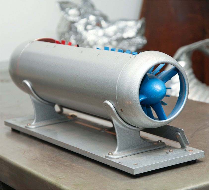Cutaway of a jet engine turbine, color coded for educational purposes. The fan blades spin. A great object.