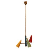 3 arm brass chandelier with different colored cones