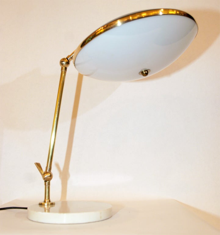 An articulated table lamp by Stilnovo Mid Century Modern shade and height adjust plexiglass light diffuser Italy 1950's
New sockets and rewired
 
 
