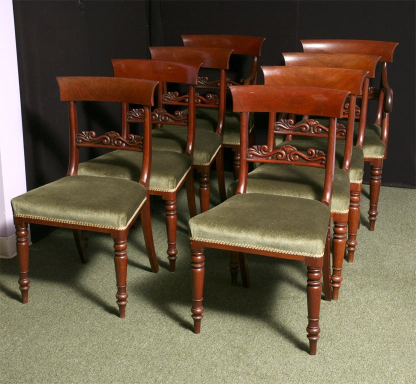 A good set of 8 mahogany English bar back dining chairs