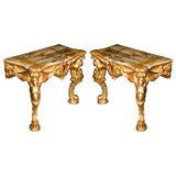 A pair of giltwood console tables.
