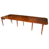 Antique A magnificent English Campaign dining table