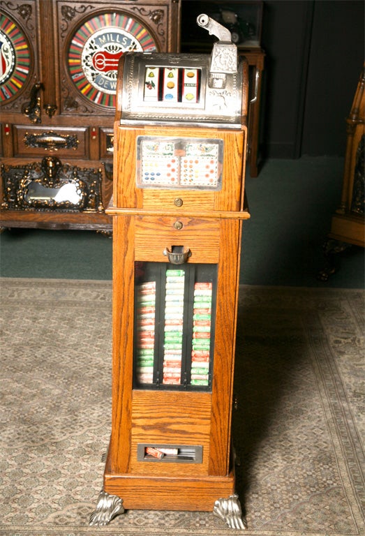 A Mills of Chicago slot machine with mint vendor.This machine though a fully working pay out slot machine was classified as a vanding machine to get round strict gambling laws in certain areas of the country.Our macihnes are all in the finest